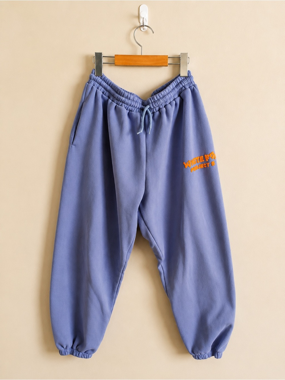 White Fox Boutique Project 5 in Grape Joggers with Orange Logo